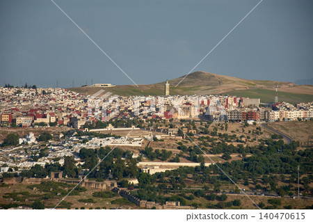 An aerial perspective reveals the complex historical architecture and mosques of the ancient city of Fez in Morocco An aerial perspective reveals the complex historical architecture and mosques of the ancient city of Fez in Morocco 140470615