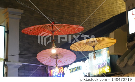 Korean Street Decor Umbrellas and Neon Lights at Night 140470719