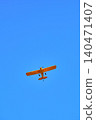 Small plane in the sky 140471407