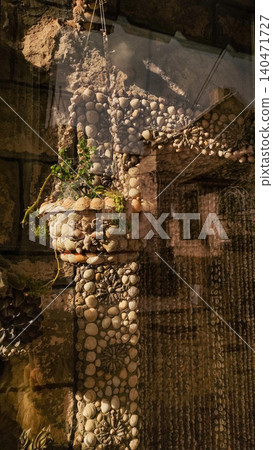 Seashell decorations adorning stone wall in croatia during summer vacation Seashell decorations adorning stone wall in croatia during summer vacation 140471727