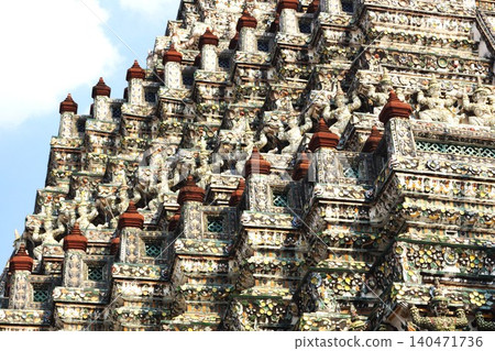 Wat Arun, Bangkok, Thailand: Ceramic decorations on the large stupa. Wat Arun, Bangkok, Thailand: Ceramic decorations on the large stupa. 140471736