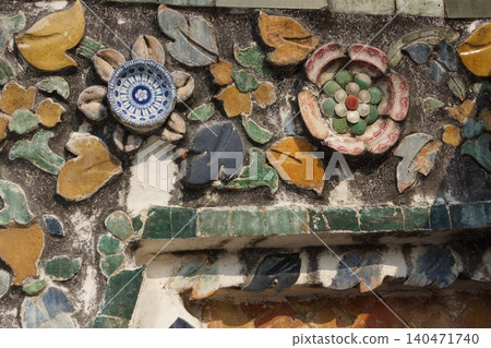 Wat Arun, Bangkok, Thailand: Ceramic decorations on the large stupa. Wat Arun, Bangkok, Thailand: Ceramic decorations on the large stupa. 140471740