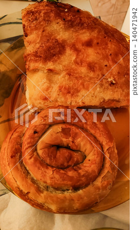 Traditional croatian burek and savijaca pastry enjoyed during summer vacation Traditional croatian burek and savijaca pastry enjoyed during summer vacation 140471942
