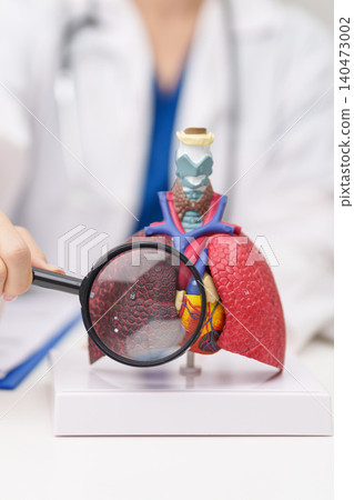 Doctor with Smoker Lung anatomy with magnifying glass. Lung Cancer, Asthma, Chronic Obstructive Pulmonary or COPD, Bronchitis, Emphysema, Cystic Fibrosis, Bronchiectasis, Pneumonia and world Lung day Doctor with Smoker Lung anatomy with magnifying glass. Lung Cancer, Asthma, Chronic Obstructive Pulmonary or COPD, Bronchitis, Emphysema, Cystic Fibrosis, Bronchiectasis, Pneumonia and world Lung day 140473002