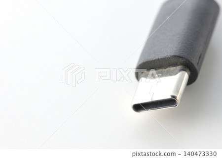 A USB-C cable photographed against a white background. 140473330