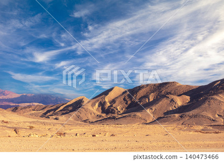 Mountain nature landscape. Desert on a sunny day. Negev Desert. View of the valley with mountains on backdrop. Nature Israel 140473466