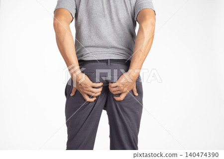 Hemorrhoidal pain, man with hemorrhoids on white background. Hemorrhoidal pain, man with hemorrhoids on white background. 140474390