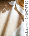 Ribbons placed on the wood grain and soft light 140474710