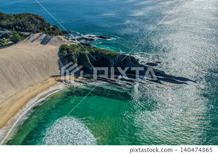 Aerial scene capturing Bennetts Head and the prominent sand dune overlooking One Mile Beach near Forster, NSW, Australia. Aerial scene capturing Bennetts Head and the prominent sand dune overlooking One Mile Beach near Forster, NSW, Australia. 140474865