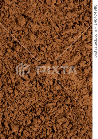 Vertical cooking background spilled natural cocoa powder Vertical cooking background spilled natural cocoa powder 140474990