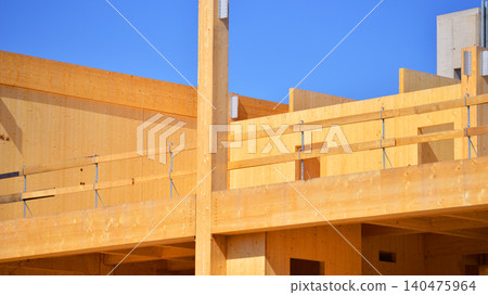 Laminate wood floors and supports of a mass timber multi story green, sustainable office building construction project Laminate wood floors and supports of a mass timber multi story green, sustainable office building construction project 140475964