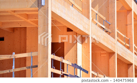 Laminate wood floors and supports of a mass timber multi story green, sustainable office building construction project Laminate wood floors and supports of a mass timber multi story green, sustainable office building construction project 140475968