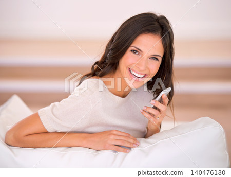 Woman, phone call and speaker with smile on sofa in living room for talking, portrait and chat in home. Person, cellphone and happy for mobile network with connection on lounge at house in Barcelona Woman, phone call and speaker with smile on sofa in living room for talking, portrait and chat in home. Person, cellphone and happy for mobile network with connection on lounge at house in Barcelona 140476180