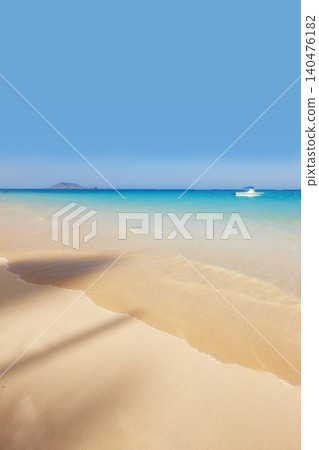 Ocean, Hawaii and blue sky for holiday, sand and rocks in shore for peace and tranquility. Seaside, waves and summer for vacation, location and beach for clear water on travel and tropical trip Ocean, Hawaii and blue sky for holiday, sand and rocks in shore for peace and tranquility. Seaside, waves and summer for vacation, location and beach for clear water on travel and tropical trip 140476182