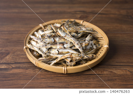 Dried sardines served in a basket Dried sardines served in a basket 140476263