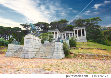 Rhodes Memorial, monument and architecture in Cape Town, outdoor and design for historic building. Tourism, landmark or statue of famous politician, sculpture or art work on mountain in South Africa 140476374