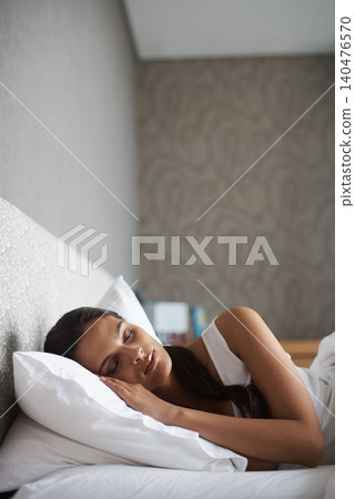 Woman, sleeping and bed for rest, dream and wellness as stress relief in bedroom in Rio de Janeiro. Mental health, female person and eyes closed on pillow for calm, peace and relax for self care Woman, sleeping and bed for rest, dream and wellness as stress relief in bedroom in Rio de Janeiro. Mental health, female person and eyes closed on pillow for calm, peace and relax for self care 140476570