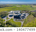 Panoramic drone shot of an eco-friendly biogas production facility in the rural landscape of Hammel, Denmark 140477499
