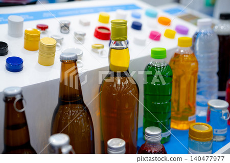 Caps packaging concept. Bottle caps and closures packaging design. Screw caps. Plastic cap and pilfer-proof cap. Various cap products. Bottle caps for alcohol drink, beer, water, and fruit juice. 140477977