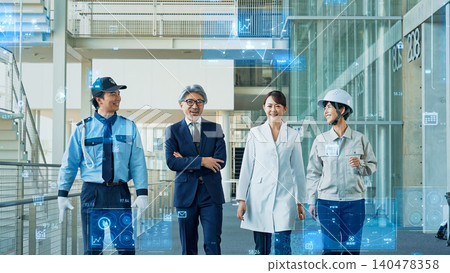 People of various professions walking through lobby with digital technology People of various professions walking through lobby with digital technology 140478358