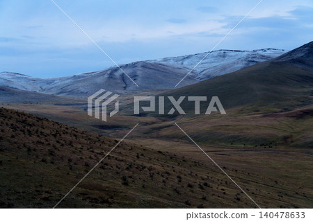 Khustai National Park in the early morning after a snowfall: A fantastical landscape of Mongolian grasslands. Khustai National Park in the early morning after a snowfall: A fantastical landscape of Mongolian grasslands. 140478633