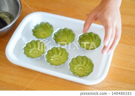 Photo of refreshing matcha jelly served in a glass dish. Photo of refreshing matcha jelly served in a glass dish. 140480181
