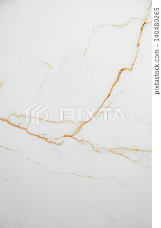 A white marble background with subtle brown veining and a natural stone texture. A white marble background with subtle brown veining and a natural stone texture. 140480265