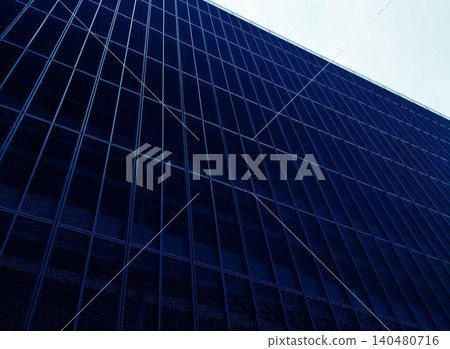 Glass building pattern. Exterior view of modern glass structure with geometric design Glass building pattern. Exterior view of modern glass structure with geometric design 140480716