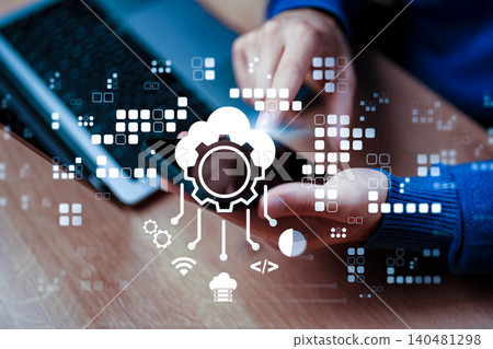 Business professional uses technology for cloud-based ERP and CRM solutions in office Business professional uses technology for cloud-based ERP and CRM solutions in office 140481298