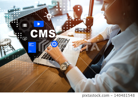 Working on a content management system at a cafe in the afternoon Working on a content management system at a cafe in the afternoon 140481548