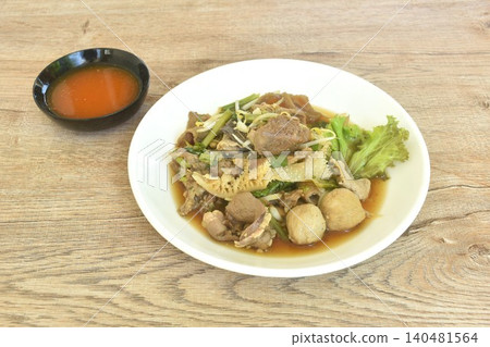 dry boiled braised beef meat and meatball couple assorted organ with bean sprout on plate dipping spicy chili sauce 140481564