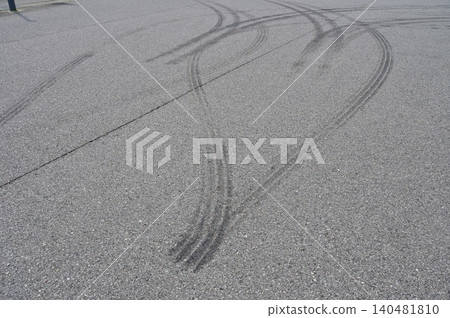 Tire burnout marks on asphalt 140481810