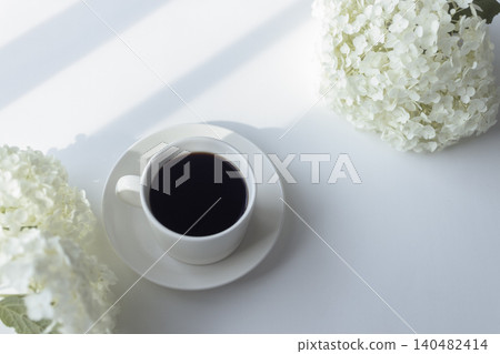 A morning with white hydrangeas and coffee. 140482414