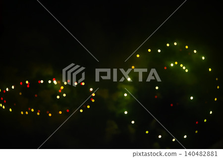 Stunning and colorful fireworks display in the night sky. Real fireworks background. Abstract of real shining fireworks against black background. Glowing fireworks show for celebration. Stunning and colorful fireworks display in the night sky. Real fireworks background. Abstract of real shining fireworks against black background. Glowing fireworks show for celebration. 140482881