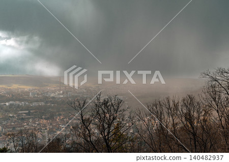 Heavy Rain Falling Over European Town Heavy Rain Falling Over European Town 140482937