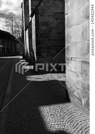 Erfurt, Germany - March 27, 2026. Black and White Historic Stone Street Erfurt, Germany - March 27, 2026. Black and White Historic Stone Street 140482944