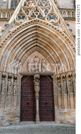 Erfurt, Germany - March 27, 2026. Gothic Portal Stone Detail Erfurt, Germany - March 27, 2026. Gothic Portal Stone Detail 140482975