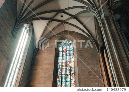 Erfurt, Germany - March 27, 2026. Gothic Arches and Stained Glass Erfurt, Germany - March 27, 2026. Gothic Arches and Stained Glass 140482979
