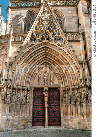 Erfurt, Germany - March 27, 2026. Ornate Gothic Cathedral Portal Erfurt, Germany - March 27, 2026. Ornate Gothic Cathedral Portal 140483014
