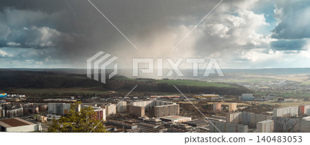 Storm Rain and Sunlight Over City Valley Storm Rain and Sunlight Over City Valley 140483053