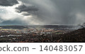 Dramatic Rain Clouds Over European Town 140483057
