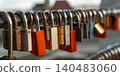 Colorful Locks on Railing With Soft City Background 140483060