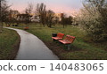 Red Benches Along Wet Park Path 140483065