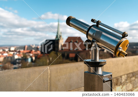 Erfurt, Germany - March 27, 2026. Telescope With Blurred Erfurt Cathedral View 140483066