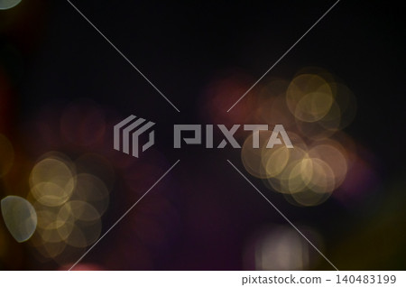 Bokeh effect of colorful fireworks display in the night sky. Real fireworks background. Abstract of real shining fireworks against black background. Glowing fireworks show for celebration. Bokeh effect of colorful fireworks display in the night sky. Real fireworks background. Abstract of real shining fireworks against black background. Glowing fireworks show for celebration. 140483199