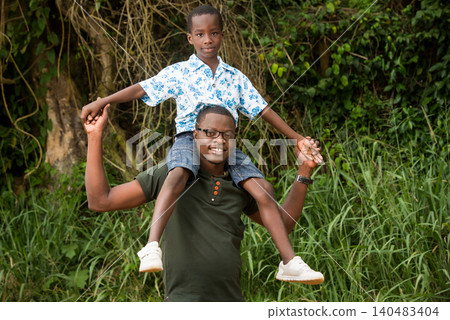 young family going for a walk young family going for a walk 140483404