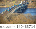 Kyiv Metro Bridge with Blue Subway Trains and Car Traffic over Dnipro River in Ukraine 140483714