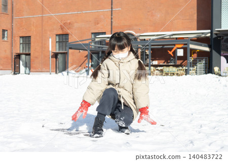 Happy Asian Child Playing in Snow Winter Outdoor, Cute Girl Making Snowball and Snowman, Joyful Cold Weather Lifestyle Happy Asian Child Playing in Snow Winter Outdoor, Cute Girl Making Snowball and Snowman, Joyful Cold Weather Lifestyle 140483722