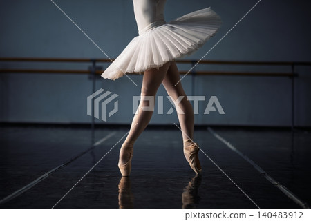 Ballerina feet in pointe shoes Ballerina feet in pointe shoes 140483912