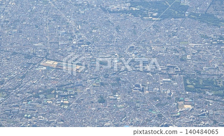 Aerial photograph showing the cityscape around Higashi-Koganei from Musashi-Sakai (aerial view of the Chuo Line area and the Musashino/Koganei area). Aerial photograph showing the cityscape around Higashi-Koganei from Musashi-Sakai (aerial view of the Chuo Line area and the Musashino/Koganei area). 140484065
